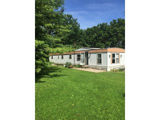 3.318+/- Acres between Columbia City and Fort Wayne on Lincolnway.  Mobile home, well, septic, and 2 acres of planted walnut trees.  Nice pole building with lean-to.  Easy to heat, storage or work shop, multi-use.  Great potential building site. - Residential/Industrial